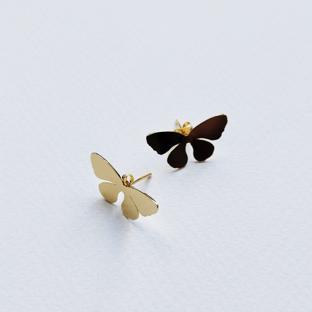 Monarca aretes