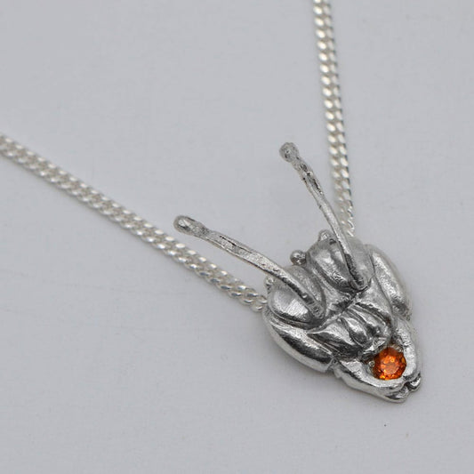 Melipona cabeza con topacio