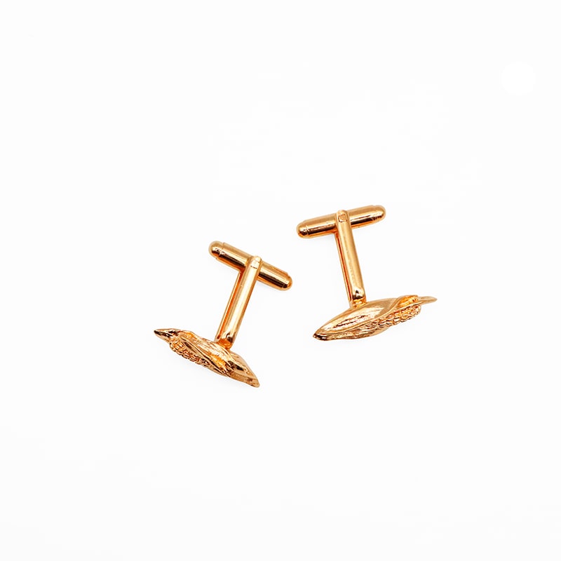 Hijos del Maiz mancuernillas doradas